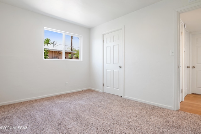 empty room with carpet floors