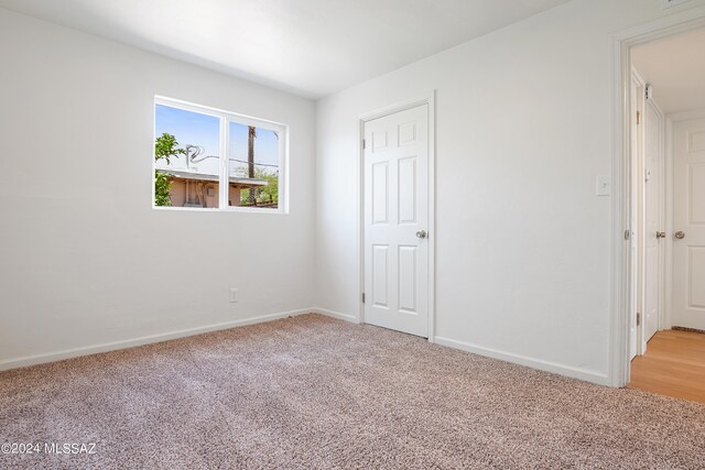 empty room with carpet floors