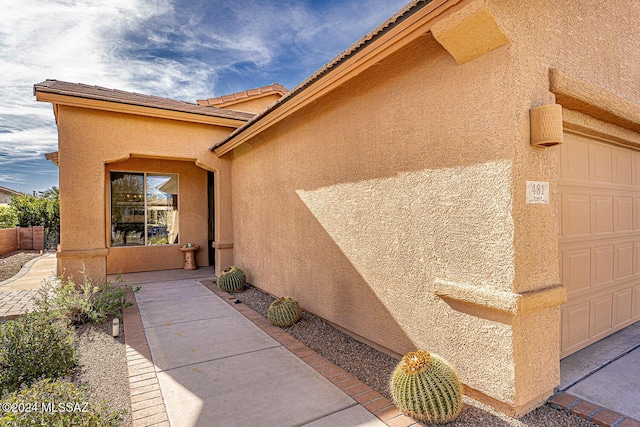 view of home's exterior with a garage