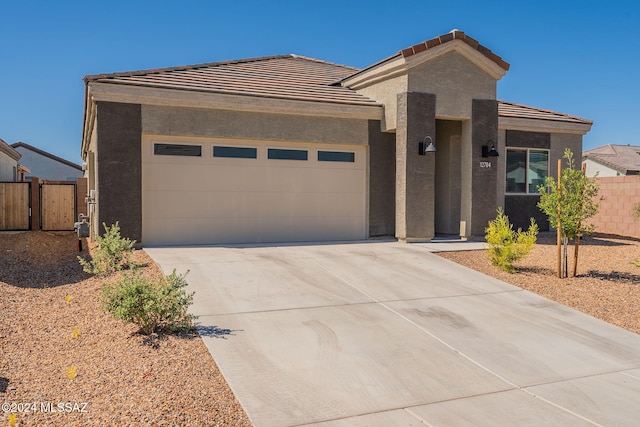 view of front of property with a garage