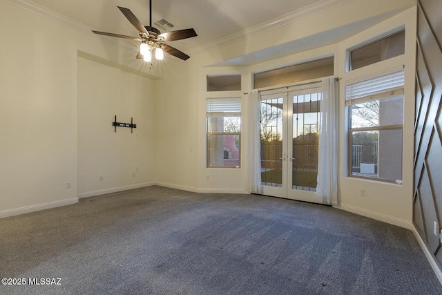 unfurnished room with french doors, carpet floors, ceiling fan, and crown molding