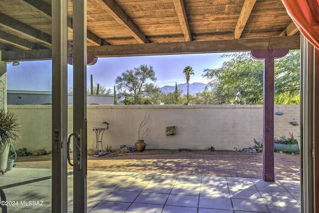 view of patio / terrace with a mountain view