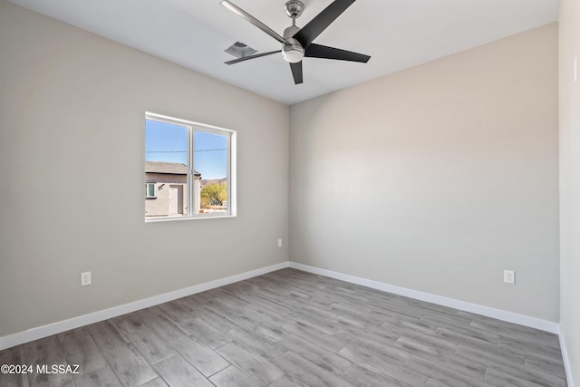 unfurnished room with light hardwood / wood-style floors and ceiling fan