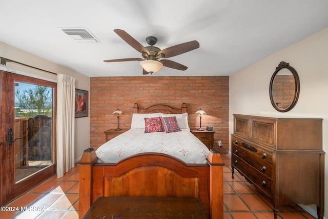 tiled bedroom with ceiling fan