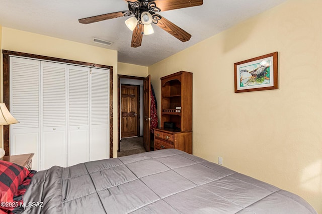 unfurnished bedroom with a closet and ceiling fan