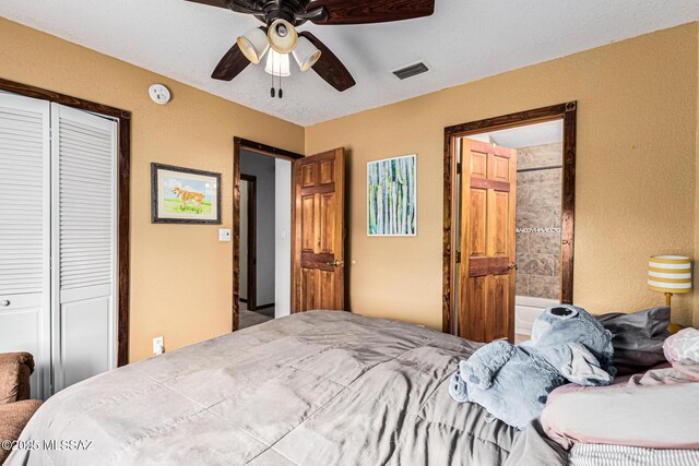 bedroom with ceiling fan and a closet