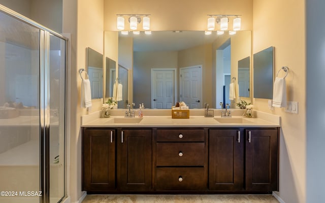 bathroom with vanity and walk in shower