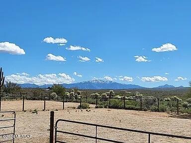 mountain view featuring a rural view