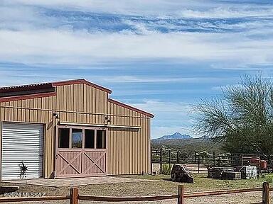 view of outdoor structure featuring a mountain view