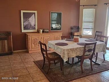 view of tiled dining area