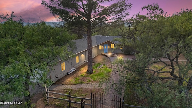 view of property exterior at dusk