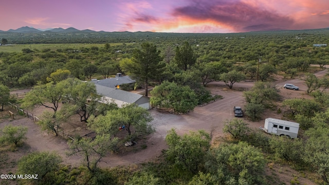 aerial view at dusk with a mountain view