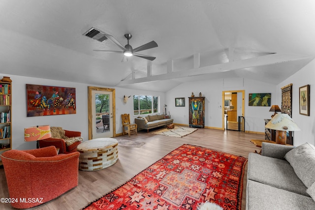 living room with light wood-type flooring, lofted ceiling with beams, and ceiling fan