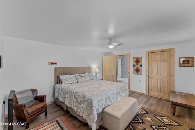 bedroom featuring ceiling fan and wood-type flooring