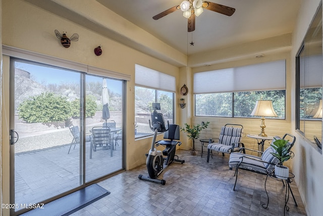 sunroom / solarium with ceiling fan