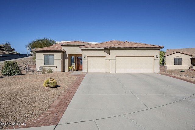 mediterranean / spanish-style home featuring a garage