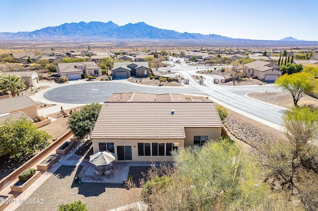 drone / aerial view featuring a mountain view