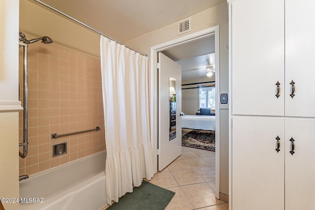 bathroom featuring tile patterned flooring and shower / bath combination with curtain