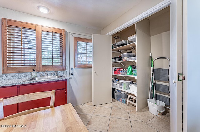 bathroom featuring tile patterned floors and sink