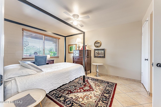 bedroom featuring ceiling fan and light tile patterned floors