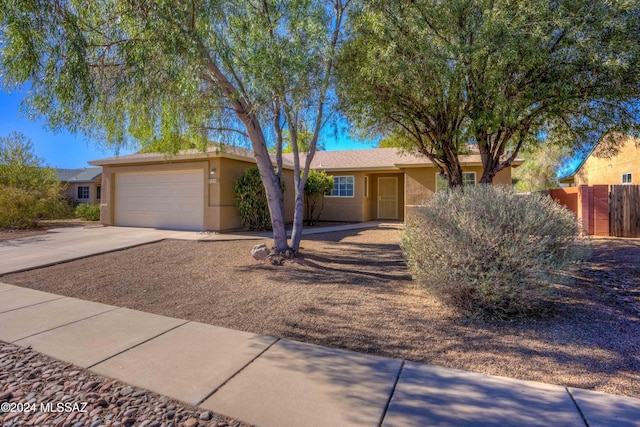 single story home with a garage