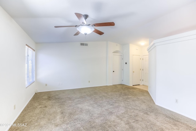 carpeted empty room with ceiling fan