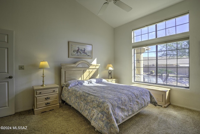 carpeted bedroom featuring high vaulted ceiling and ceiling fan