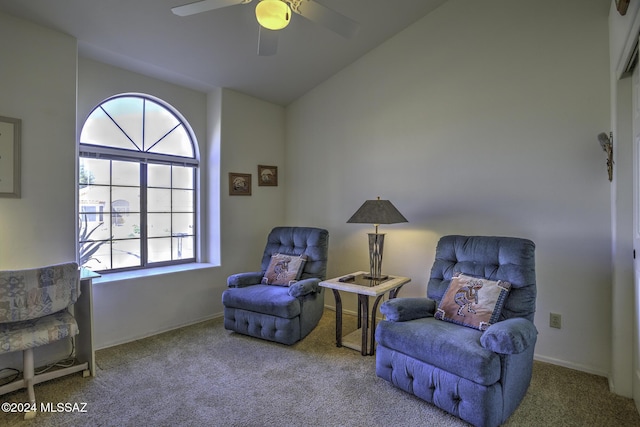 sitting room featuring carpet flooring, ceiling fan, and vaulted ceiling