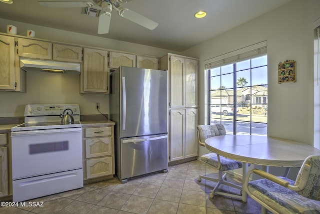 kitchen with ceiling fan, stainless steel fridge, light brown cabinetry, white electric range oven, and light tile patterned flooring