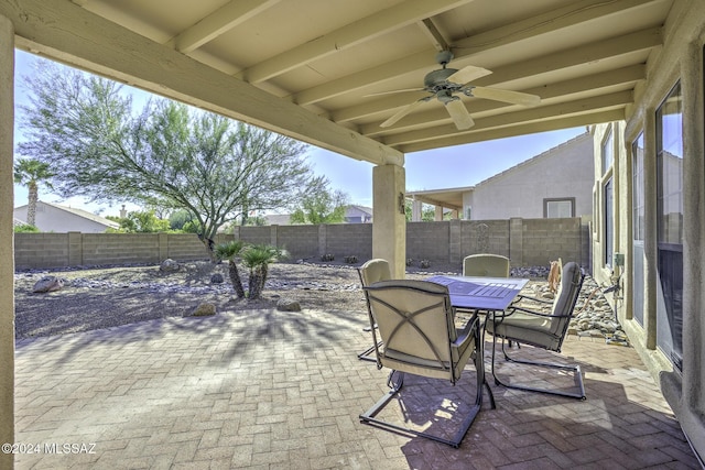 view of patio featuring ceiling fan