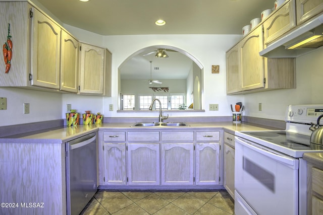 kitchen featuring light brown cabinetry, white range with electric stovetop, ceiling fan, sink, and dishwasher