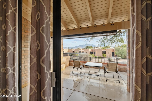 balcony featuring a mountain view