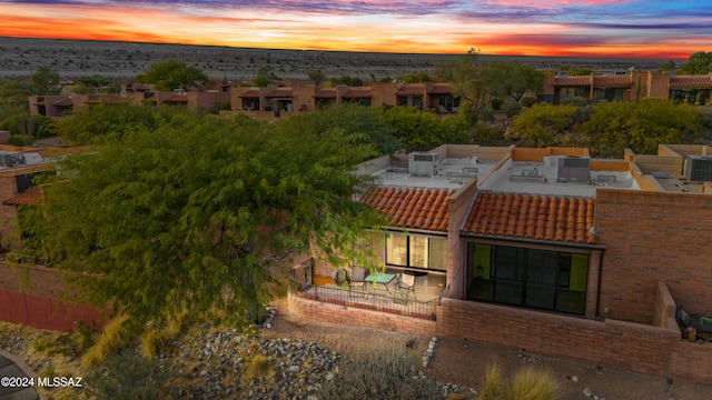 view of aerial view at dusk