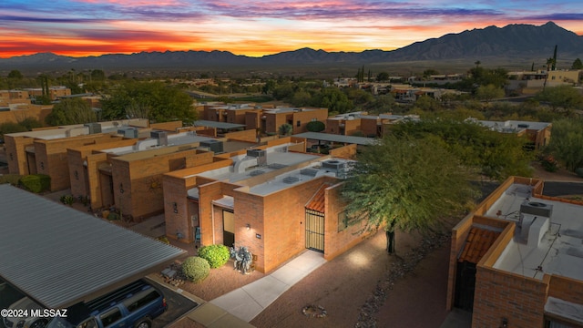 aerial view at dusk with a mountain view