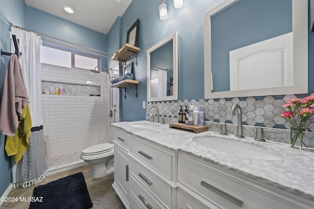 bathroom with tasteful backsplash, a shower with curtain, vanity, tile patterned flooring, and toilet