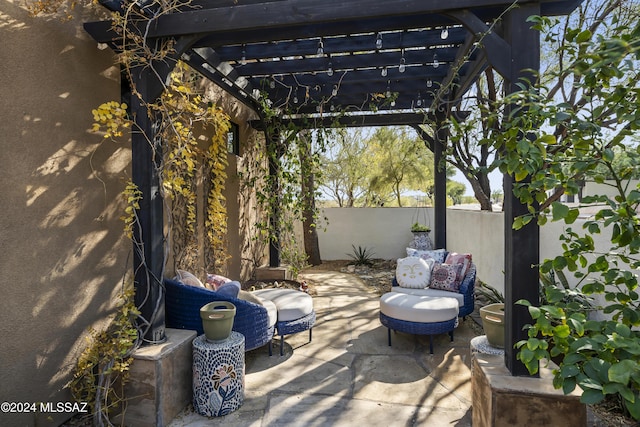 view of patio featuring a pergola