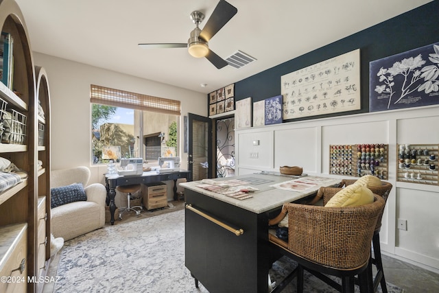 tiled home office with ceiling fan