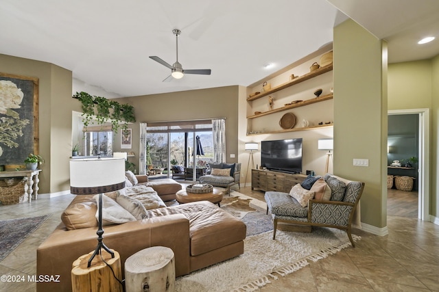 tiled living room with ceiling fan