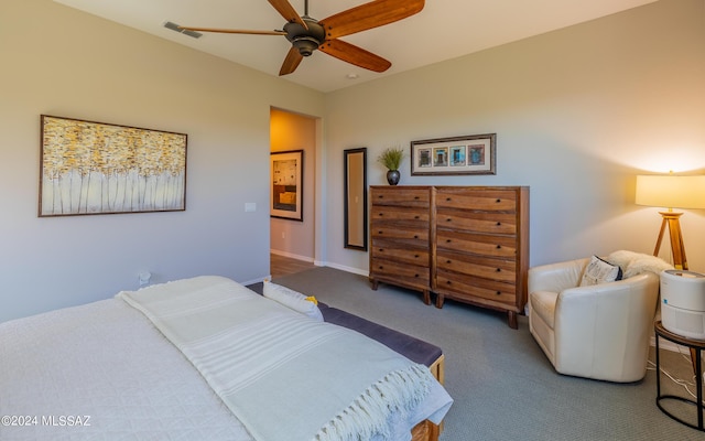 carpeted bedroom with ceiling fan