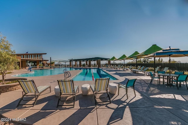 view of pool featuring a patio area