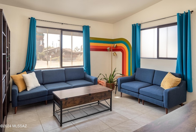 tiled living room with vaulted ceiling