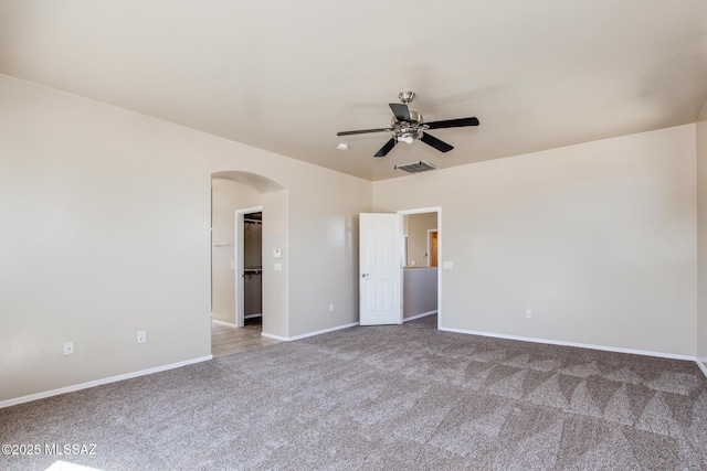 unfurnished bedroom with ceiling fan and carpet flooring