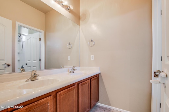 bathroom with vanity and tile patterned floors