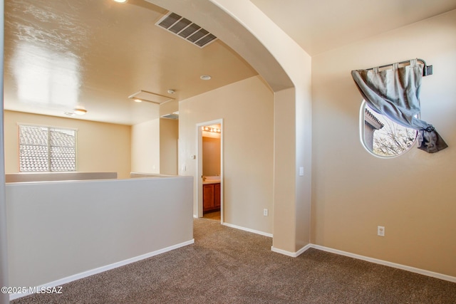 empty room with carpet floors