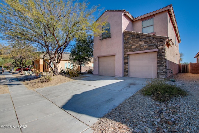 view of front of home featuring a garage