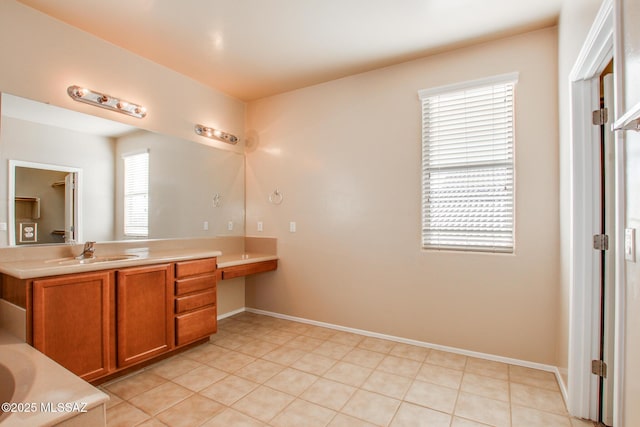 bathroom with vanity and tile patterned flooring