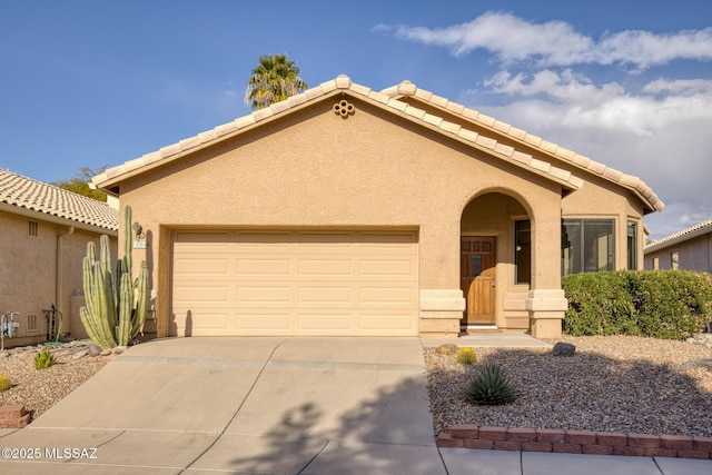 view of front of property with a garage