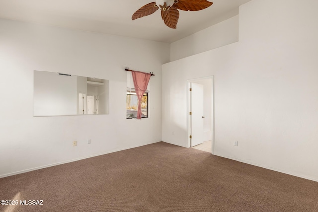 empty room with light carpet and ceiling fan