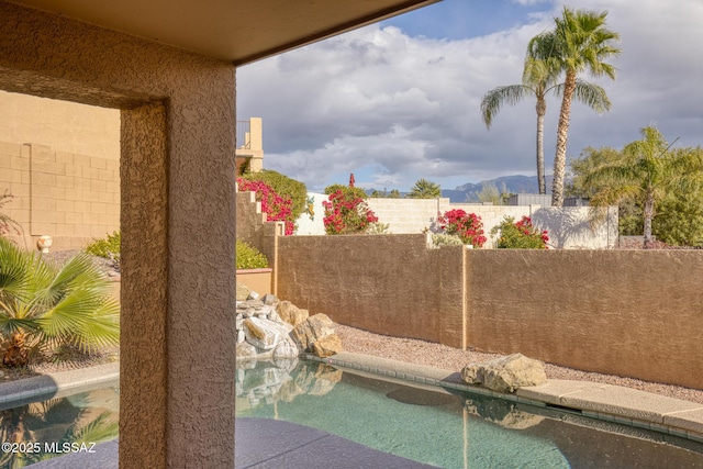 view of pool featuring a mountain view