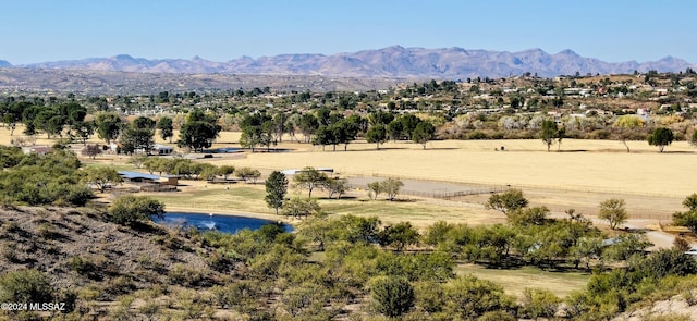 mountain view featuring a rural view